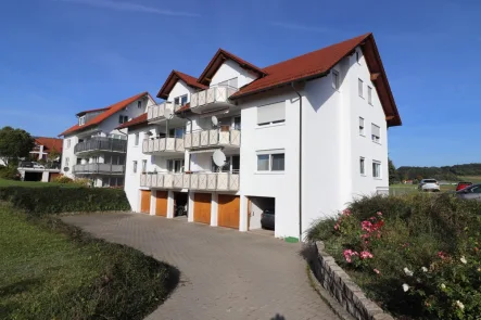 Süd-Westseite - Wohnung kaufen in Münsingen - Ruhig gelegene 3-Zimmer-Erdgeschoss-Wohnung mit Garage und Keller in Münsingen zu verkaufen