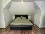 Helles Schlafzimmer im Dachgeschoß
