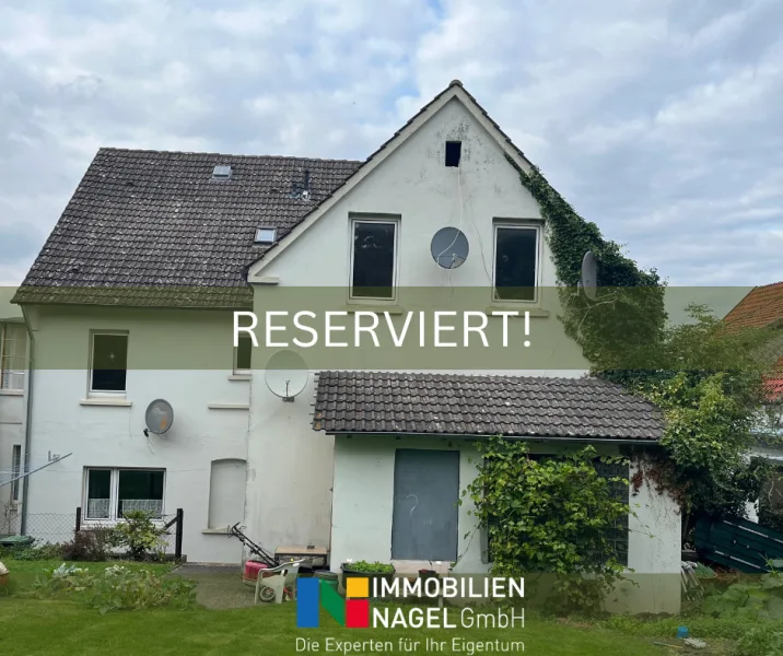 Titelbild reserviert! - Haus kaufen in Vlotho - Sanierungsbedürftiges Zweifamilienhaus in Vlotho!