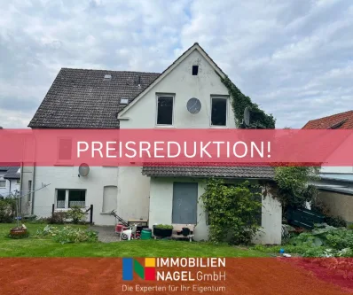 Preisreduktion! - Haus kaufen in Vlotho - Sanierungsbedürftiges Zweifamilienhaus in Vlotho!