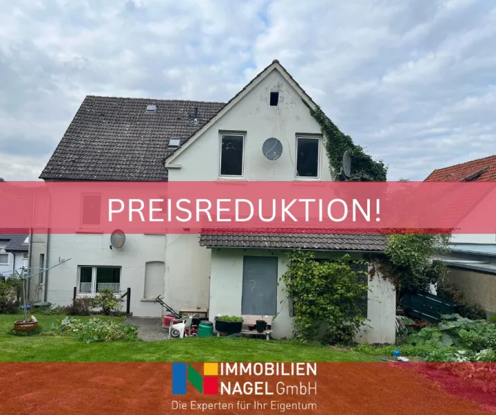 Preisreduktion! - Haus kaufen in Vlotho - Sanierungsbedürftiges Zweifamilienhaus in Vlotho!