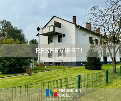 RESERVIERT! - Wohnung kaufen in Bad Oeynhausen - Komfortable 4-Zimmer-Wohnung im Dachgeschoss mit Stellplatz in Bad Oeynhausen-Dehme