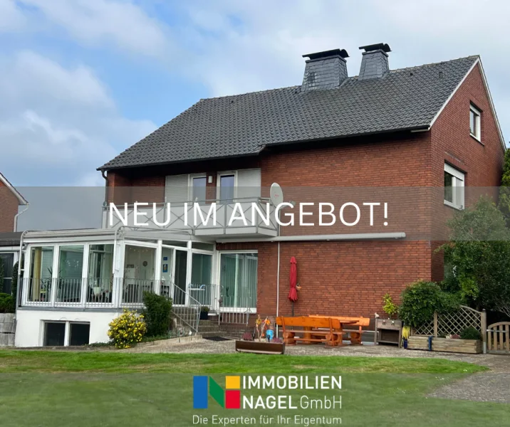 Neu im Angebot - Haus kaufen in Löhne - Charmantes Zweifamilienhaus in Löhne-Gohfeld mit angrenzendem Baugrundstück!