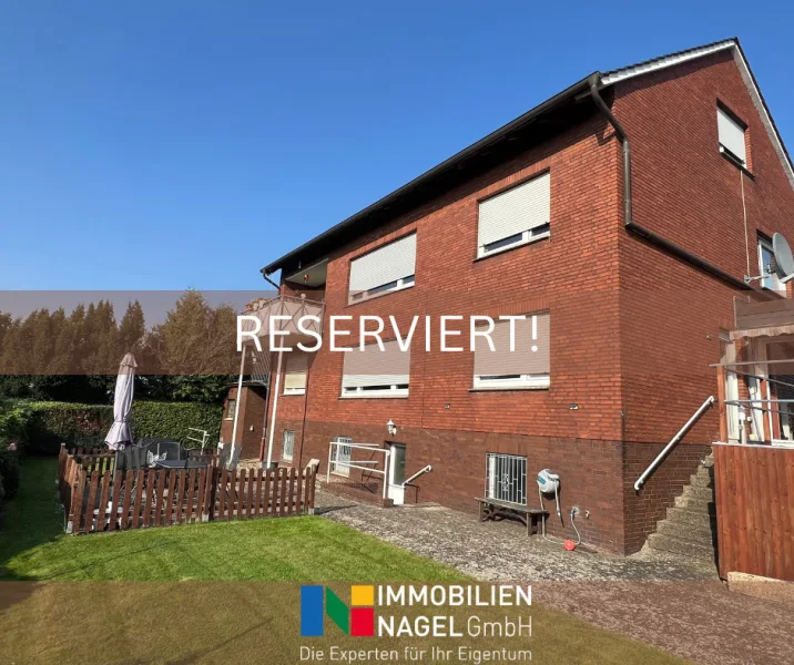 Reserviert - Haus kaufen in Löhne - Vollvermietetes Dreifamilienhaus mit Garagen und Stellplätzen in Gohfeld!