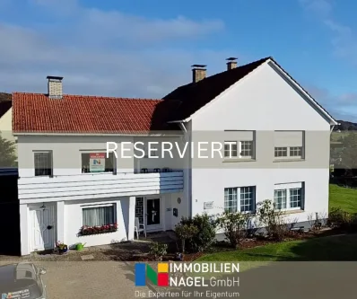 RESERVIERT! - Haus kaufen in Preußisch Oldendorf - Vielfältig nutzbares Ein-/Zweifamilienhaus mit großem Grundstück in ruhiger Nachbarschaft