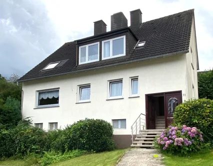 Titelbild - Haus kaufen in Vlotho - Zweifamilienhaus in zentraler Lage von Vlotho – Perfekt für Kapitalanleger oder zur Eigennutzung!