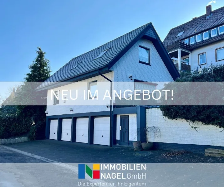 NEU IM ANGEBOT! - Haus kaufen in Vlotho - Solides Einfamilienhaus mit modernem Wohnkomfort und einzigartiger Garagenlösung!