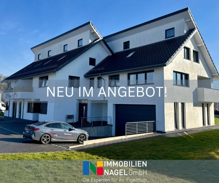 NEU IM ANGEBOT! - Haus kaufen in Espelkamp - Repräsentatives Wohn- und Geschäftshaus in Espelkamp – Moderne Architektur & Top-Lage