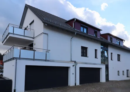 01 - Wohnung kaufen in Nufringen - Exklusive 4-Zimmer Wohnung mit Garage in Nufringens Bestlage!