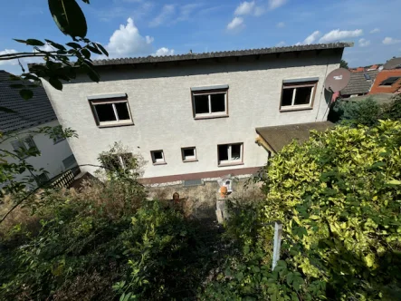 Objektansicht | Rückseite - Haus kaufen in Schaafheim - Ruhig gelegenes Einfamilienhaus mit Ausbaupotential im Dachgeschoss!