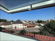 Weitläufiger Ausblick über die Dächer von Hockenheim