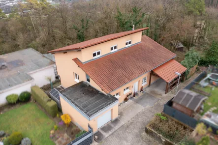 Ihr neues Zuhause - Haus kaufen in Mosbach / Waldstadt - Freie Entfaltung für Familien ! Einfamilienhaus mit ELW in Waldrandlage