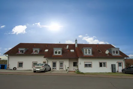  - Wohnung kaufen in Schefflenz - Gemütliche 3-Zimmerwohnung mit Balkon und 2 PKW-Stellplätzen ...