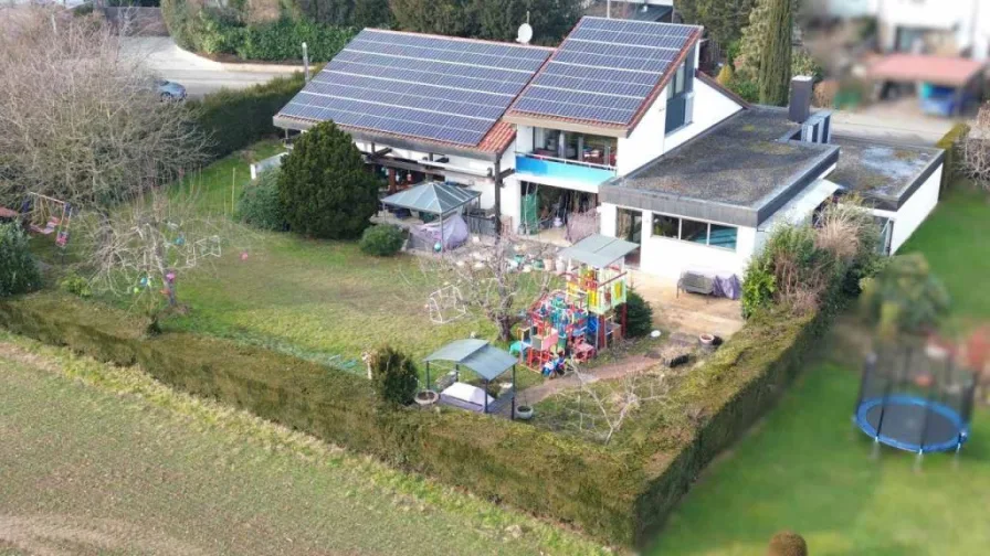 24046-JI-1 - Haus kaufen in Kusterdingen - Das Einfamilienhaus mit vielen Details und genialer Grundrissstruktur direkt am Ortsrand