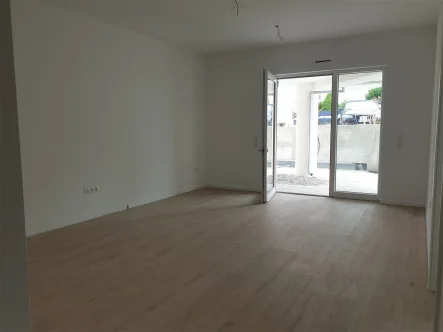 Wohnraum - Wohnung kaufen in Mönsheim - Neubau - Erstbezug - Barierrefreies Appartement