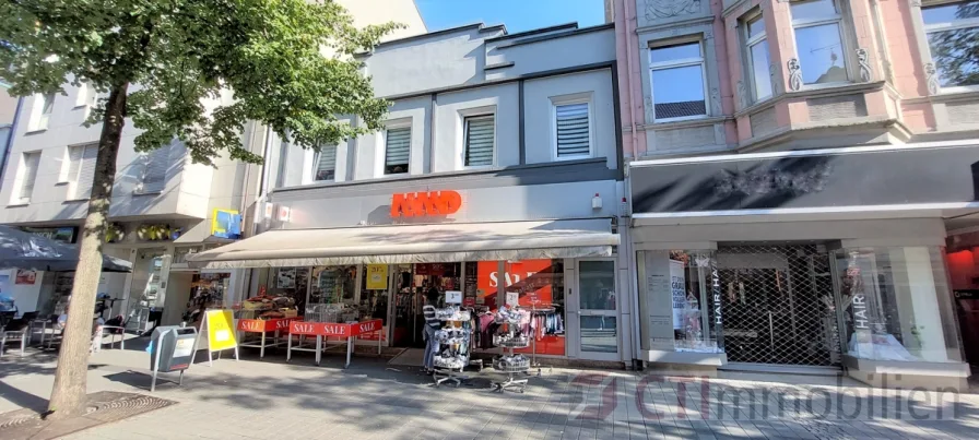 Frontansicht - Haus kaufen in Oberhausen - Faktor 11,8: Kapitalanlage in der Fußgängerzone in Sterkrade