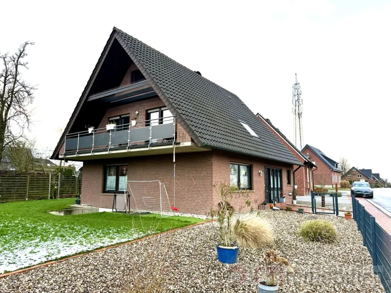 Giebelseite mit Balkon - Haus kaufen in Nordwalde - Traumhaus in Nordwalde