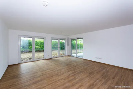 Wohnzimmer - Wohnung kaufen in Schrozberg - Exklusive Eigentumswohnung im modernen Mehrfamilienhaus "Gladiole 2" in Schrozberg