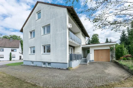 Titelbild - Haus kaufen in Hüttisheim - Vielfältige Nutzungsmöglichkeiten & großes Potenzial!