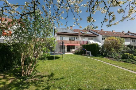Titelbild - Haus kaufen in Ulm - Ihr grünes Paradies: Modernisiertes Reiheneckhaus mit großzügigem Garten wartet auf Sie!!!