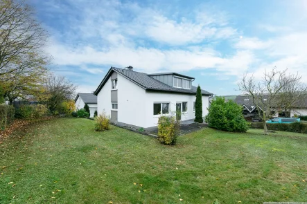 Objektansicht - Haus kaufen in Langenau - - Gemütliches Einfamilienhaus mit Ausbaupotenzial -