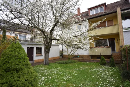 Haus mit Garten - Haus kaufen in Mannheim-Blumenau - Renovierungsbedürftig aber interessant: 1-3 Familienhaus mit tollem Garten und vielen Optionen