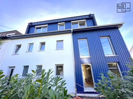 Ansicht 2 - Wohnung mieten in Trier / Heiligkreuz - B&B Immobilien: neue 3 Zimmerwohnung mit Terrasse und Gartenmitbenutzung