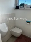 WC und Urinal im Bad