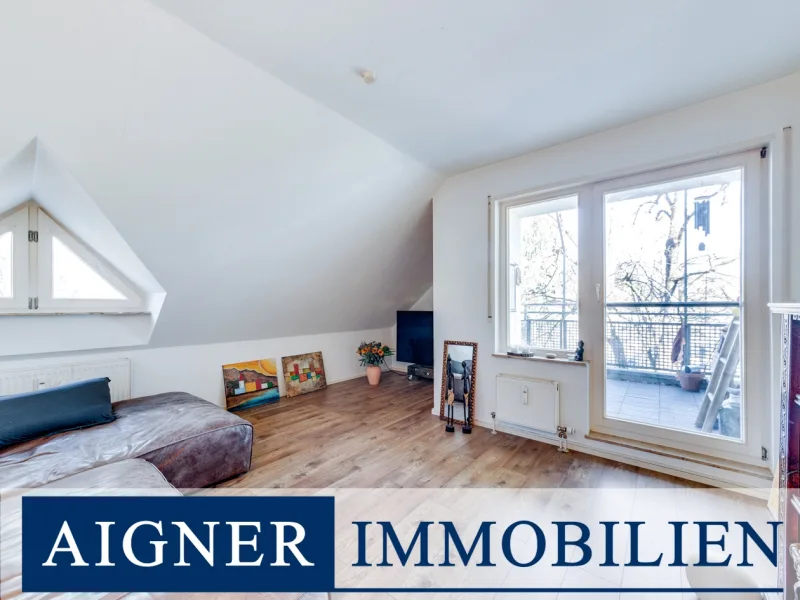 Wohnzimmer - Wohnung kaufen in München - AIGNER - Frei werdende, charmante Dachgeschosswohnung mit Loggia