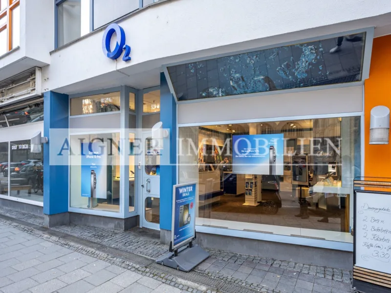 Außenansicht - Laden/Einzelhandel kaufen in München - AIGNER - Amalienpassage - Ladenfläche mit renommiertem Mobilfunkanbieter als Mieter