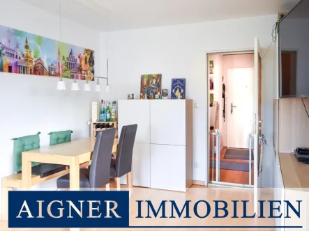 Wohn- Essbereich - Wohnung kaufen in Germering - AIGNER - Wohnen mit Weitblick: Helle 2,5-Zimmer Wohnung mit Südbalkon in Germering
