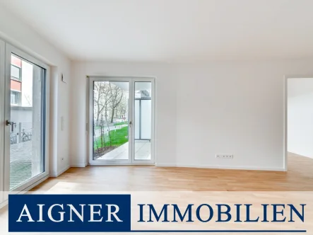 Wohnzimmer - Wohnung kaufen in München - AIGNER - Erstbezug in Top-Lage: 2-Zimmer-Wohnung als ideale Stadtwohnung oder perfekte Kapitalanlage