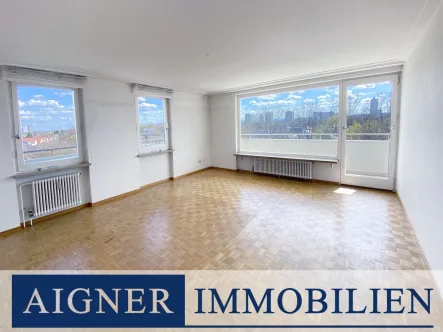 Wohnen - Wohnung kaufen in München - AIGNER - Bergblick über die Dächer Münchens: 4-Zimmer-Wohnung mit großem Südbalkon