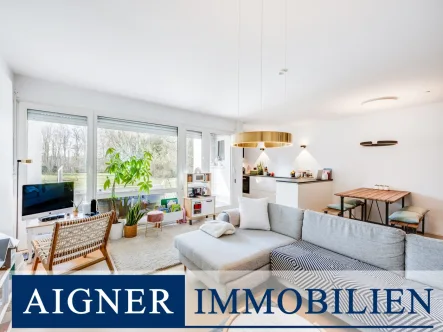 Wohnbereich - Wohnung kaufen in München - AIGNER - 3-Zimmer Wohnung mit Garten und direktem Zugang zur Isar in Harlaching!