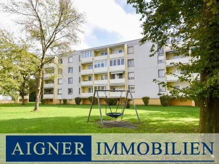 Innenhof - Wohnung kaufen in Karlsfeld - AIGNER - Kapitalanleger aufgepasst! Gepflegte 3-Zimmer-Wohnung mit 3,8% Rendite