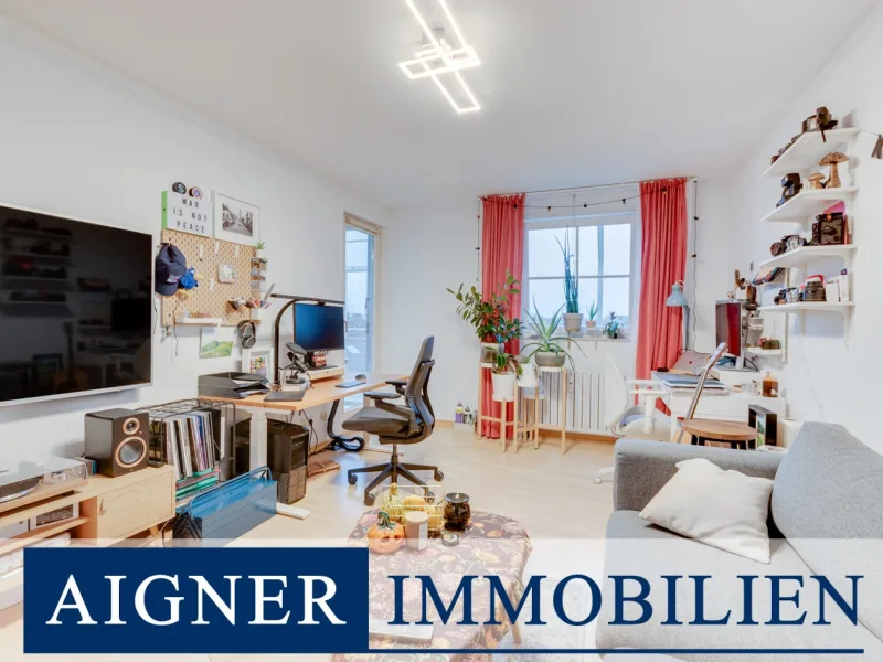 Wohnzimmer - Wohnung kaufen in München - AIGNER - Sonnendurchflutete 2-Zimmer Dachgeschosswohnung über den Dächern des Danteparks