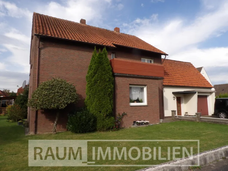 Gebäudeansicht Strassenseite - Haus kaufen in Melle - " RESERVIERT " Solides Einfamilienhaus...optional mit einem Bauplatz !!