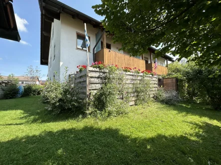 Südostansicht - Wohnung kaufen in Unterneukirchen - Vermietete 3 Zimmer Gartenwohnung