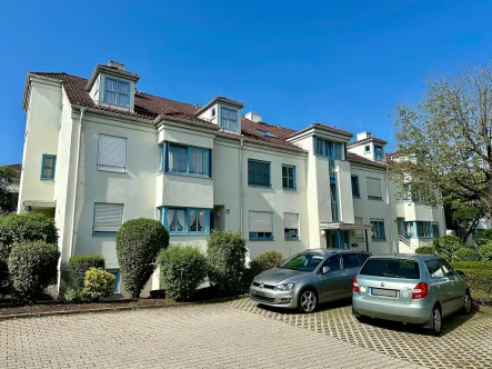 Ansicht - Wohnung kaufen in Rosenheim - Gepflegte 4-Zimmer Dachgeschosswohnung mit Tiefgaragenstellplatz!