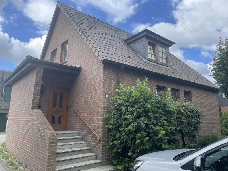 Bild1 - Haus kaufen in Wittingen-Glüsingen - Einfamilienhaus mit Einliegerwohnung in Glüsingen