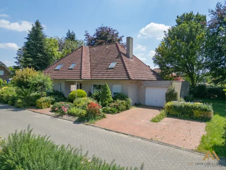  - Haus kaufen in Emstek - Verkauf im Bieterverfahren: Familienfreundlicher Bungalow mit Garage und gewachsener Gartenanlage in Emstek.