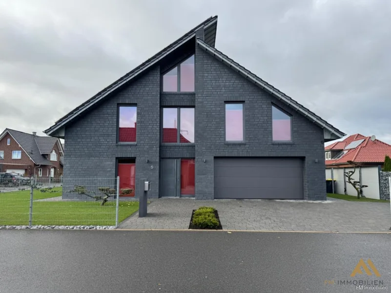 Außenansicht - Haus kaufen in Cloppenburg - Modernes und topgepflegtes Einfamilienhaus mit Garage in Cloppenburg!