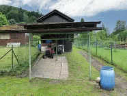 Gartenhütte mit Unterstand