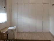 Schlafzimmer mit Einbauschrank