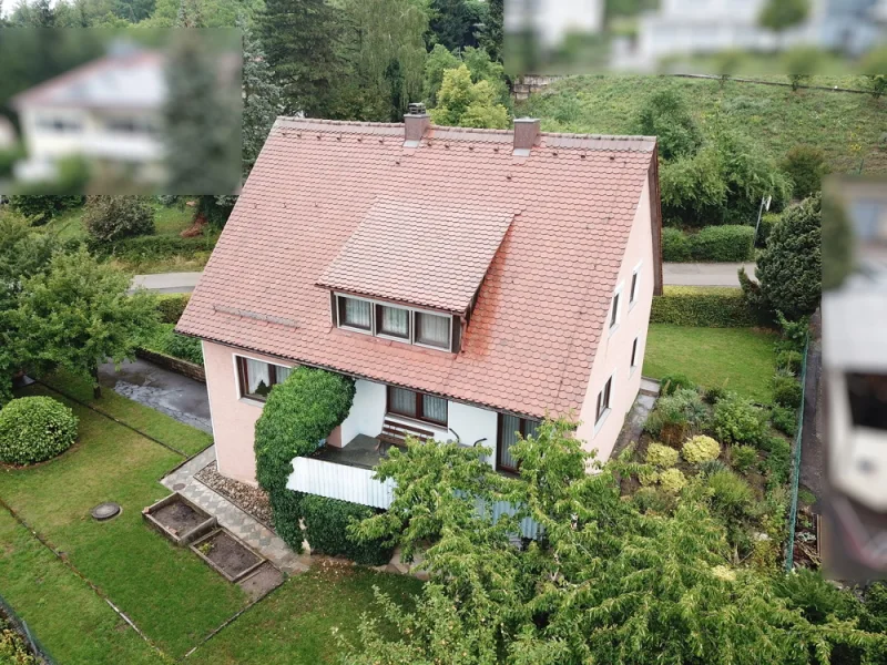 Aussenansicht 1 - Haus kaufen in Feuchtwangen - Renovierungsbedürftiges Einfamilienhaus im Wohngebiet "Weiherlache"