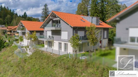 Außenansicht - Wohnung kaufen in Oberammergau - 4-Zi.-Erdgeschoss-Wohnung mit Ausblick, Terrasse und TG in Oberammergau