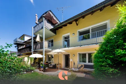Südwest Ansicht - Wohnung kaufen in München - Großzügig wohnen mit großem Balkon, Gartenanteil und Hobbyraum