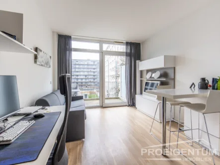 lichtdurchfluteter Wohnraum - Wohnung kaufen in München - PROEIGENTUM: Luxus 1-Zi-ETW mit edlem Wohnfeeling mit Concierge-Service und kleinem Fitnessraum ...
