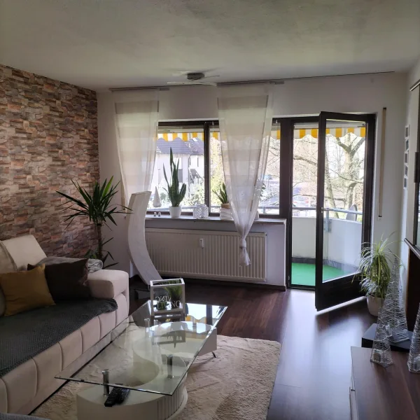 Wohnzimmer - Wohnung kaufen in Röthenbach - Top gepflegte 2-Zimmer-Eigentumswohnung mit Südbalkon