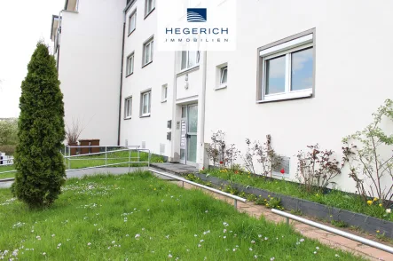 Außenansicht - Wohnung kaufen in Langenzenn - HEGERICH: Vermietete, renovierungsbedürftige Kapitalanlage im Mehrfamilienhaus!